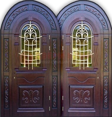 Индивидуальная арочная дверь со стеклом и ковкой ДА-19 в Челябинске