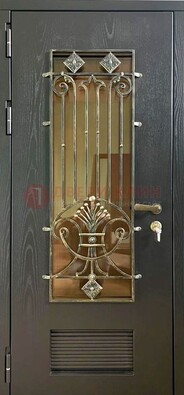 Одностворчатая железная дверь со стеклом и ковкой для дома ДСК-101 в Челябинске