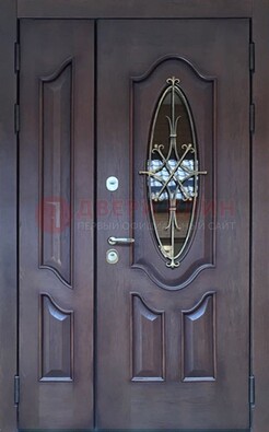 Темная металлическая дверь Винорит со стеклом и ковкой ДСК-239 в Челябинске