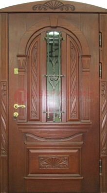Узорная железная дверь массив со стеклом и ковкой ДСК-247 в Челябинске