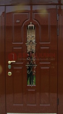 Красивая металлическая дверь со стеклом и ковкой ДСК-33 в Челябинске