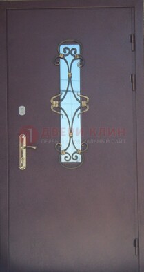 Металлическая дверь со стеклом и ковкой ДСК-77 в Челябинске
